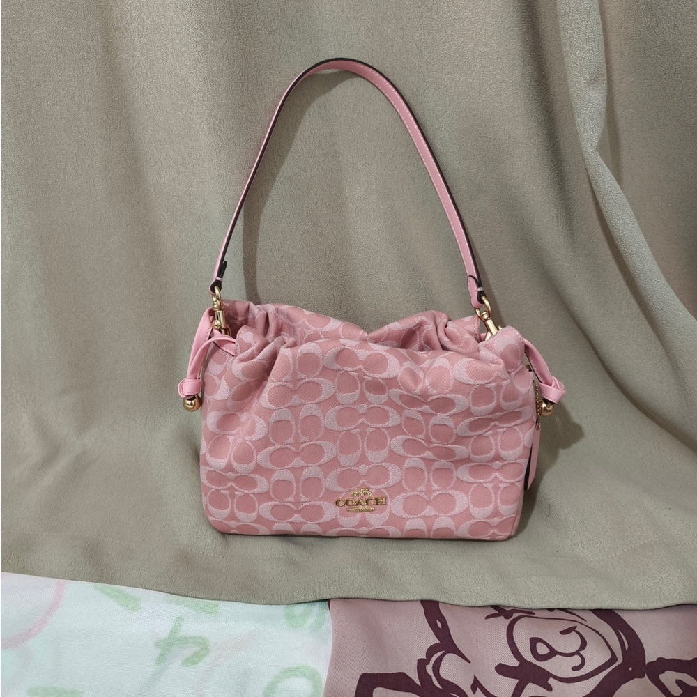 Coach Pink Signature Drawstring Shoulder Bag with Gold Hardware